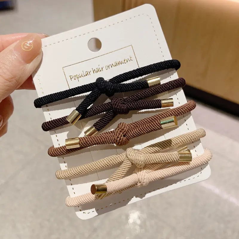 Set of five high elasticity braided wrist hair ropes in black brown and beige with gold-tone metal ends designed for secure hair styling and wrist wear.