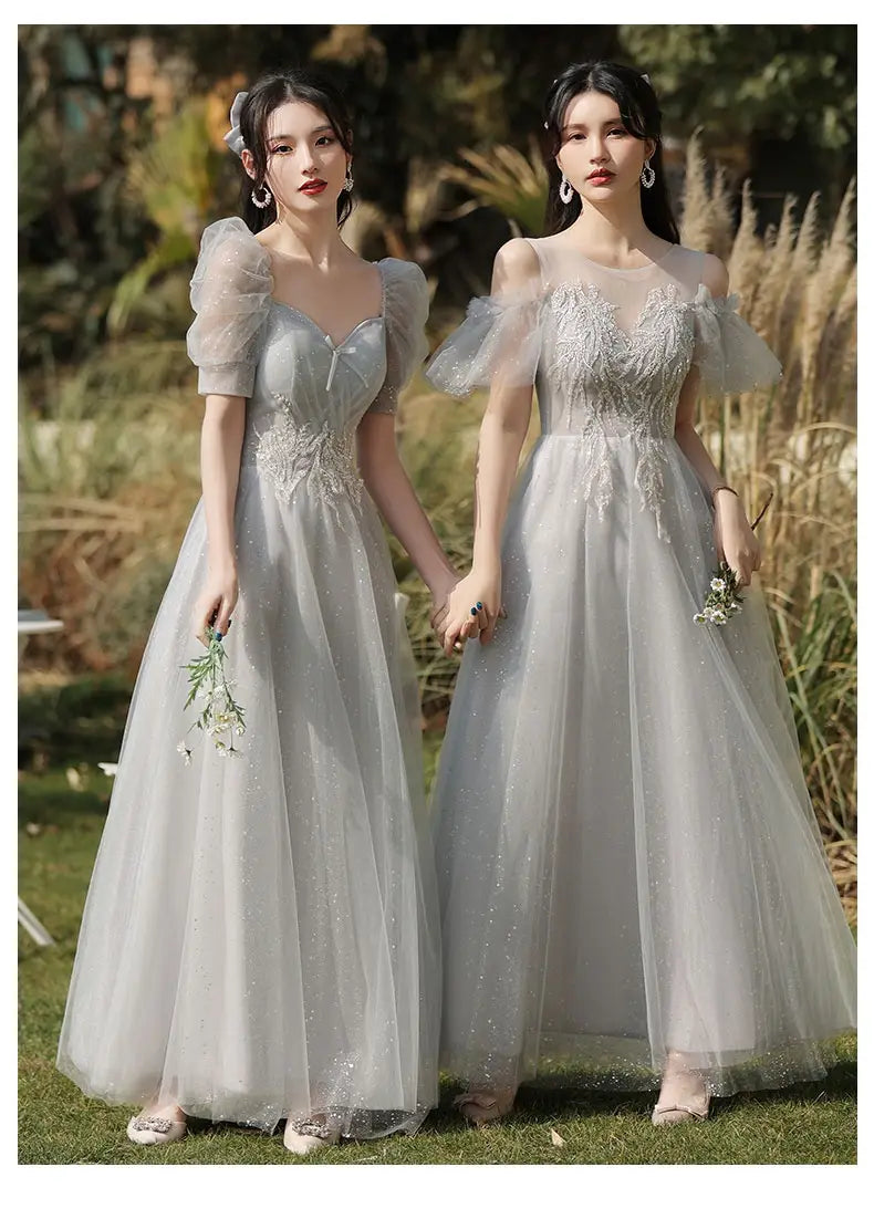 Elegant silver gray tulle sisters dress female with off-the-shoulder puffy sleeves and intricate lace detailing in a dress female gray style.