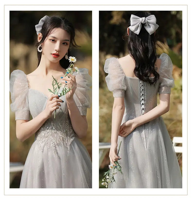 Silver gray tulle sisters dress female featuring a shimmering light gray gown with puffy short sleeves, a sparkling lace and sequin bodice, and an elegant braided lacing detail on the back.