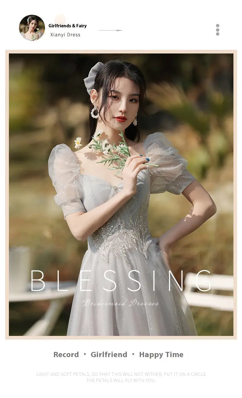 a delicate light blue lace sisters dress female with puffy short sleeves and intricate beading details from the silver gray tulle beaded dress collection