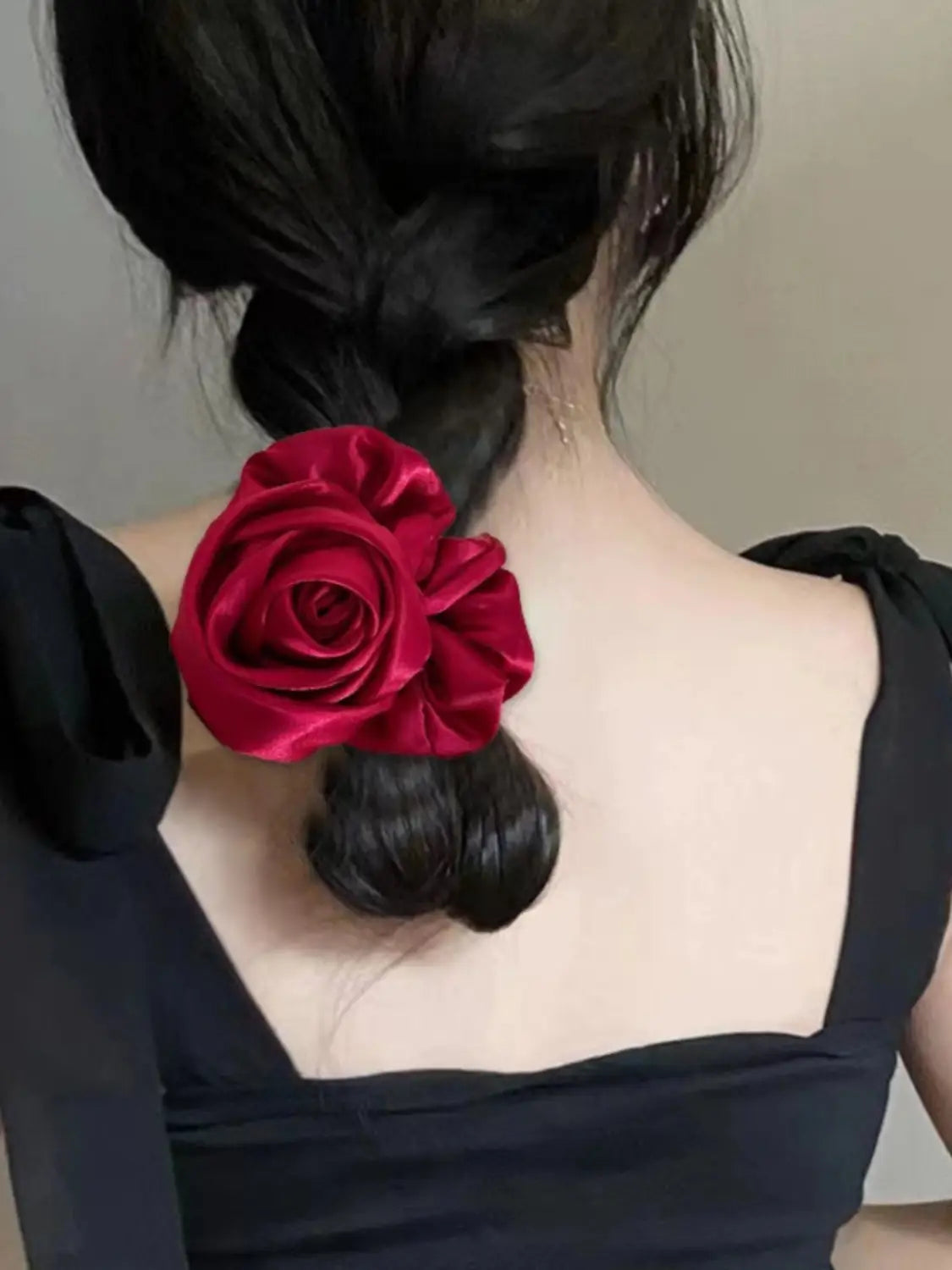 A vibrant red satin rose hair band designed for bun ponytail advanced sense styling.
