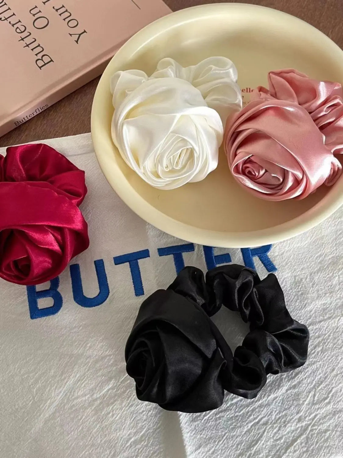 three satin rose hair band scrunchies in white pink and black designed for bun ponytail advanced sense styling