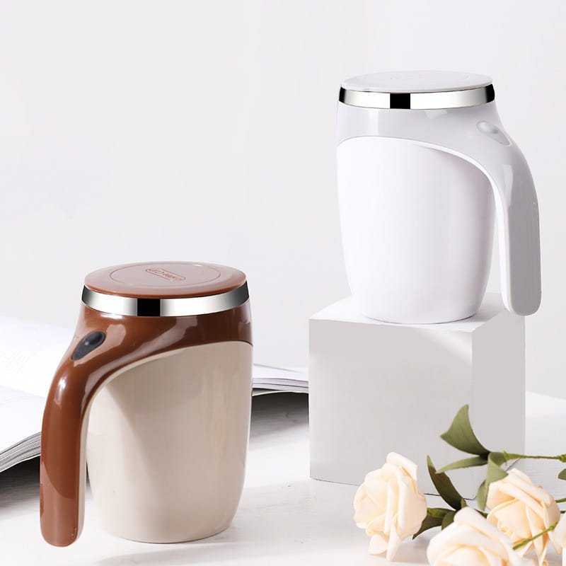White and brown ceramic rechargeable model automatic stirring cups with metallic silver rims and self-stirring feature.