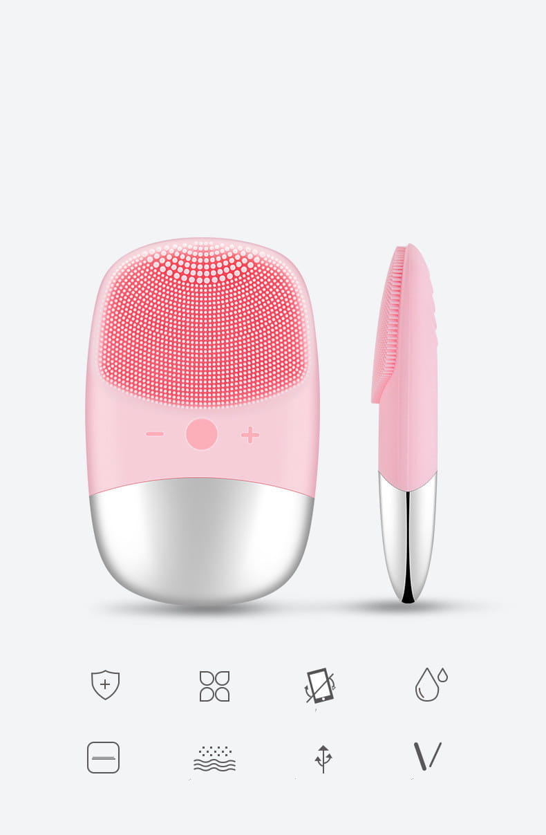 mini silicone electric facial cleanser cleansing brush in pink and silver with soft silicone bristles