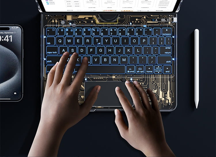 a sleek black keyboard with glowing blue backlighting and a gold circuit board design featured in the white core transparent rotating iPad keyboard pen slot offering a keyboard protective solution.
