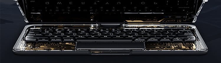 white core transparent rotating keyboard with black keys featuring exposed gold circuitry and a pen slot designed as a keyboard protective laptop accessory