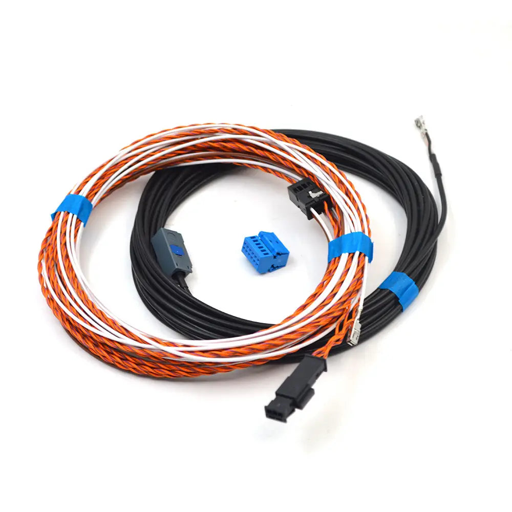 coiled automotive wiring harness for audi a4 s4 avant reverse camera handle with orange and white insulated strands, black cable sections, and blue plastic connectors.