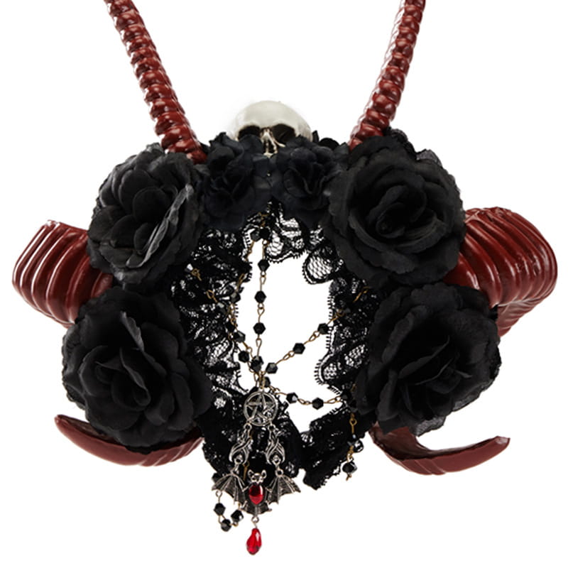 A gothic dark devil horn skull antelope horn headband featuring a glossy red horn necklace with black fabric roses and a central lace pendant with silver charms.