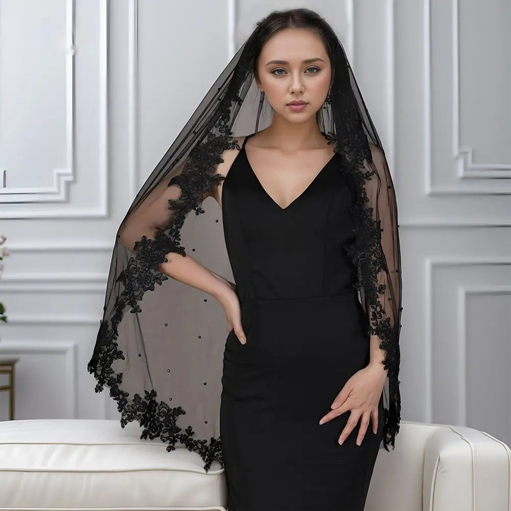 Exquisite lace black veil featuring floral embroidery and sheer mesh fabric with pearl accents for elegant occasions.
