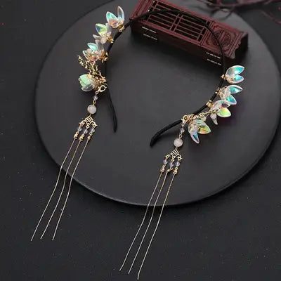 delicate gold-toned floral hanfu tassels girls fashion headbands adorned with iridescent leaf-shaped charms and dangling pearl and metallic tassels for elegant girls fashion.