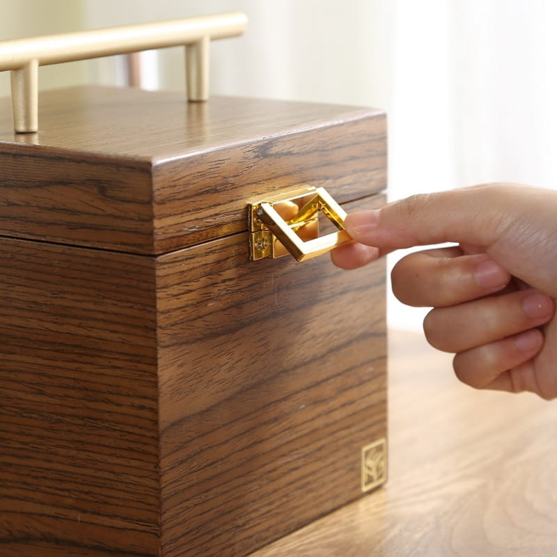 classical wooden jewelry box with mirror and velvet featuring a rectangular wooden box with warm brown finish and gold-toned metal hardware including handle and latch
