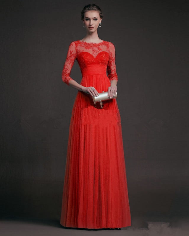 a vibrant red long sleeve lace gown featuring three-quarter sleeve lace on the bodice and a flowing tulle skirt, designed as a floor-length evening dress