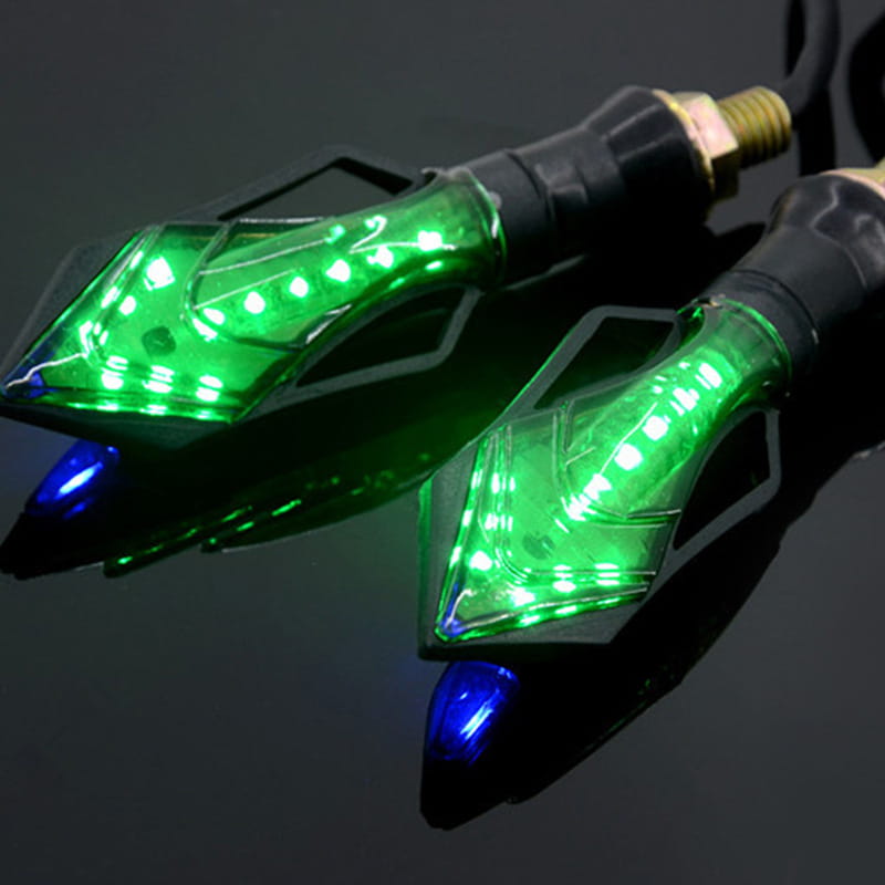 green and blue led motorcycle turn signals with a sleek angular design and clear plastic housing ideal for motorcycle modification accessories