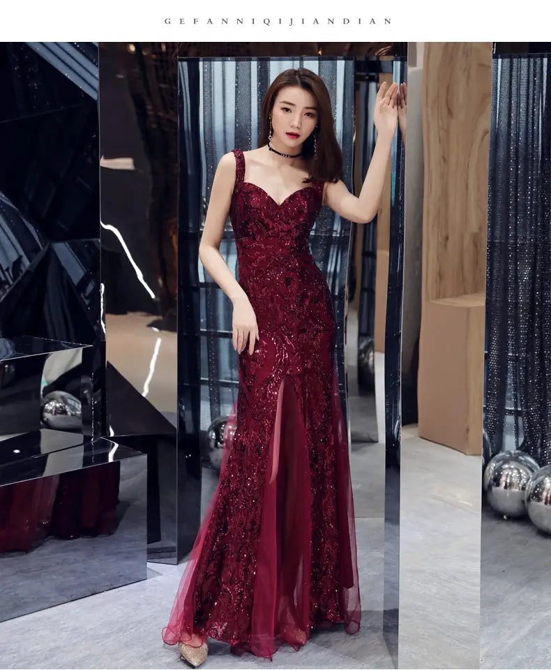 a deep red fishtail long summer sequins sling evening dress featuring intricate beaded detailing and a sheer overlay in a floor-length design