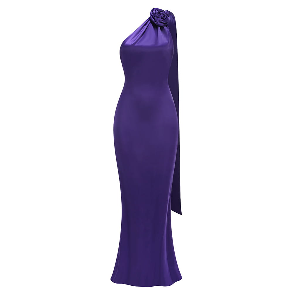 a sleek fitted high waist one shoulder gown in deep purple satin featuring a rose accent at the neckline and a flowing side panel highlighting the waist pure color design
