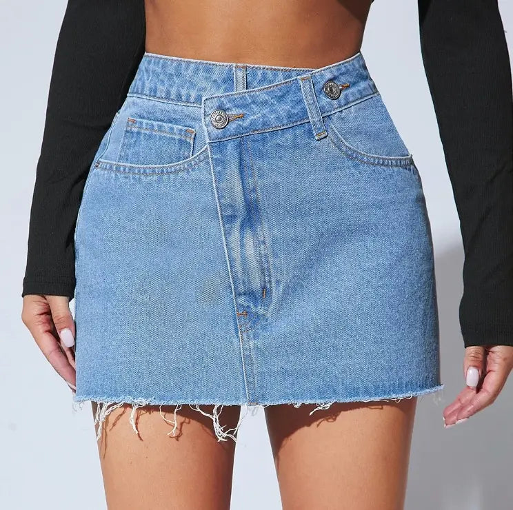 Light-wash fashion irregular denim short skirt with high waist, front button closure, and frayed hem in a short skirt design.