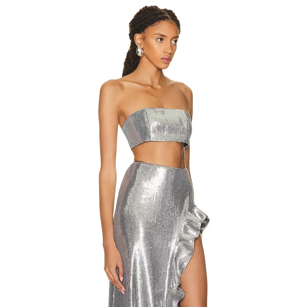 Silver strapless sequin skirt set featuring a shimmering silver sequined two-piece design with a crop top and high-slit ruffle sequin skirt.