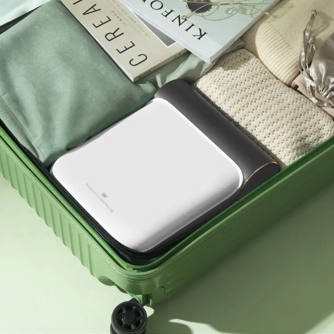 White and black rectangular portable charger with rounded edges and sleek minimalist design for foldable clothes household small quick drying use