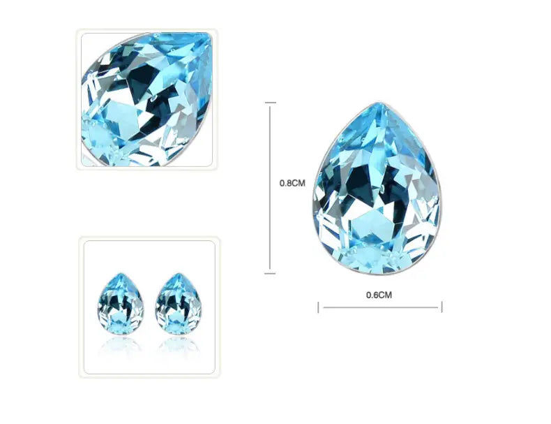 A faceted light blue teardrop-shaped crystal gemstone measuring 0.8cm by 0.6cm featured in a creative alloy jewelry set necklace.