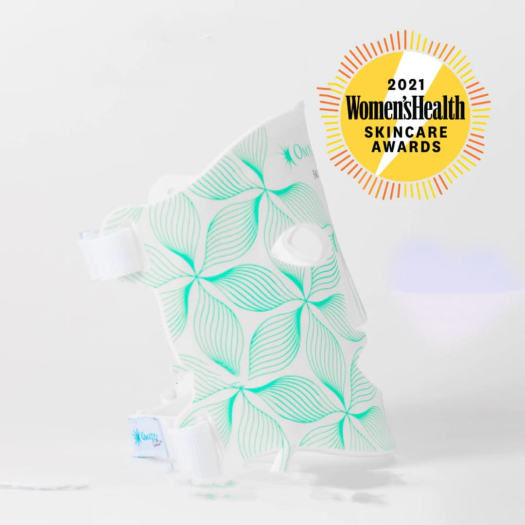 minilux collagen anti aging beauty instrument facial mask in white and mint green with leaf patterns made of soft flexible material for anti aging beauty care.