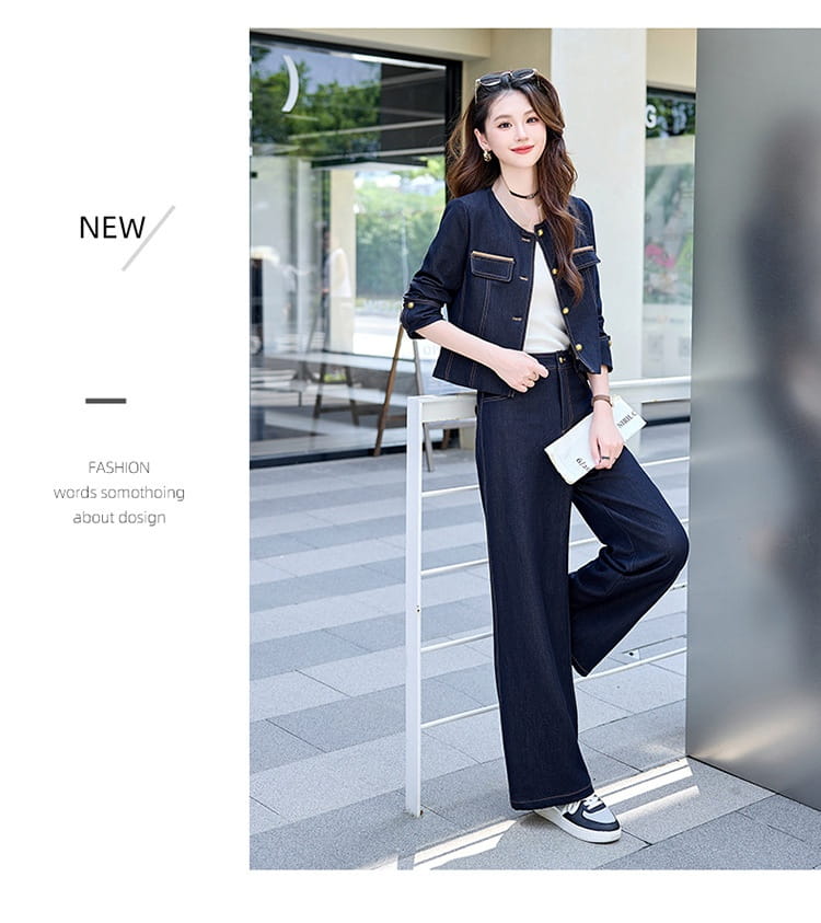 Navy blue denim jacket with gold-tone buttons and matching wide-leg trousers in an elegance retro casual denim set.