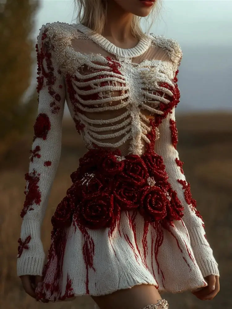 A white long-sleeved floral 3d-printed knitted dress with a skeletal ribcage design, red rose embellishments, and a round neckline from Royale Essence Lux.