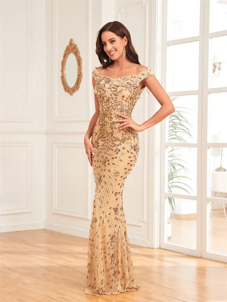 A shimmering gold beaded mermaid-style evening gown with intricate floral embroidery and a fitted silhouette designed as a sequined sexy high waist formal dress.