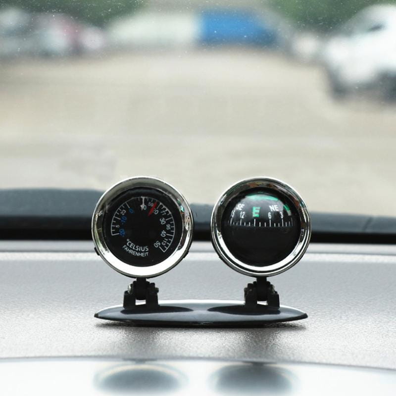 silver-framed chrome speedometer and seat car compass dashboard gauge featuring a dual-function celsius and fahrenheit thermometer with black dials for accurate seat car navigation.