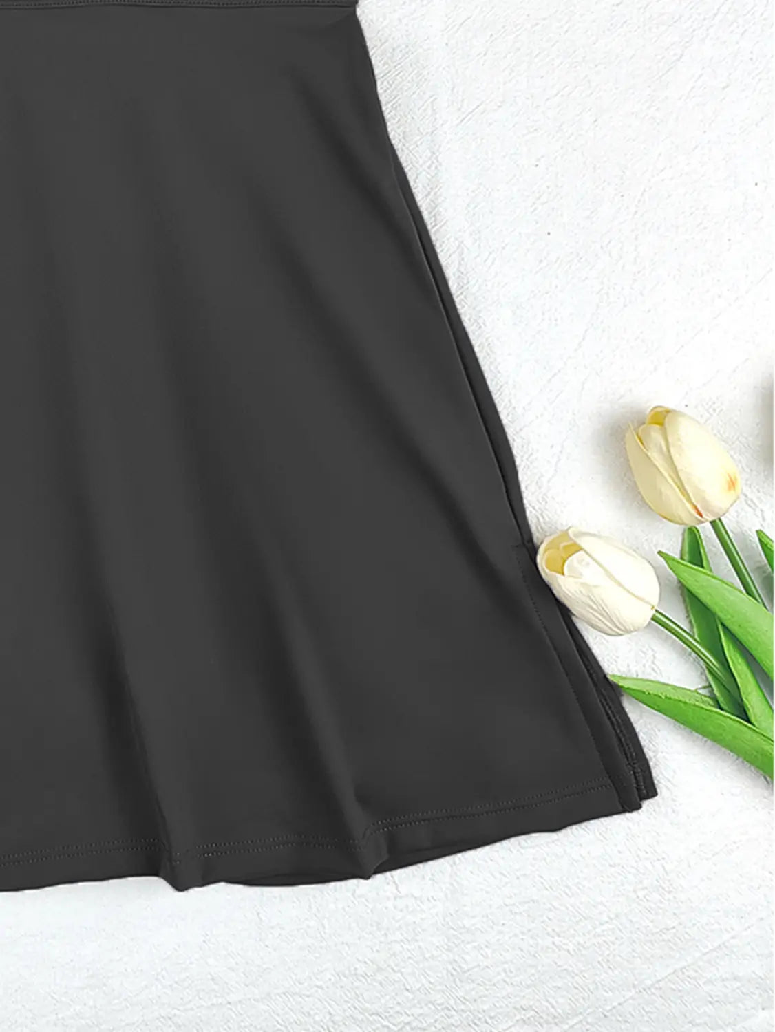 black smooth-textured sleeveless side slit yoga tennis skirt sport dress with simple elegant design for athletic use