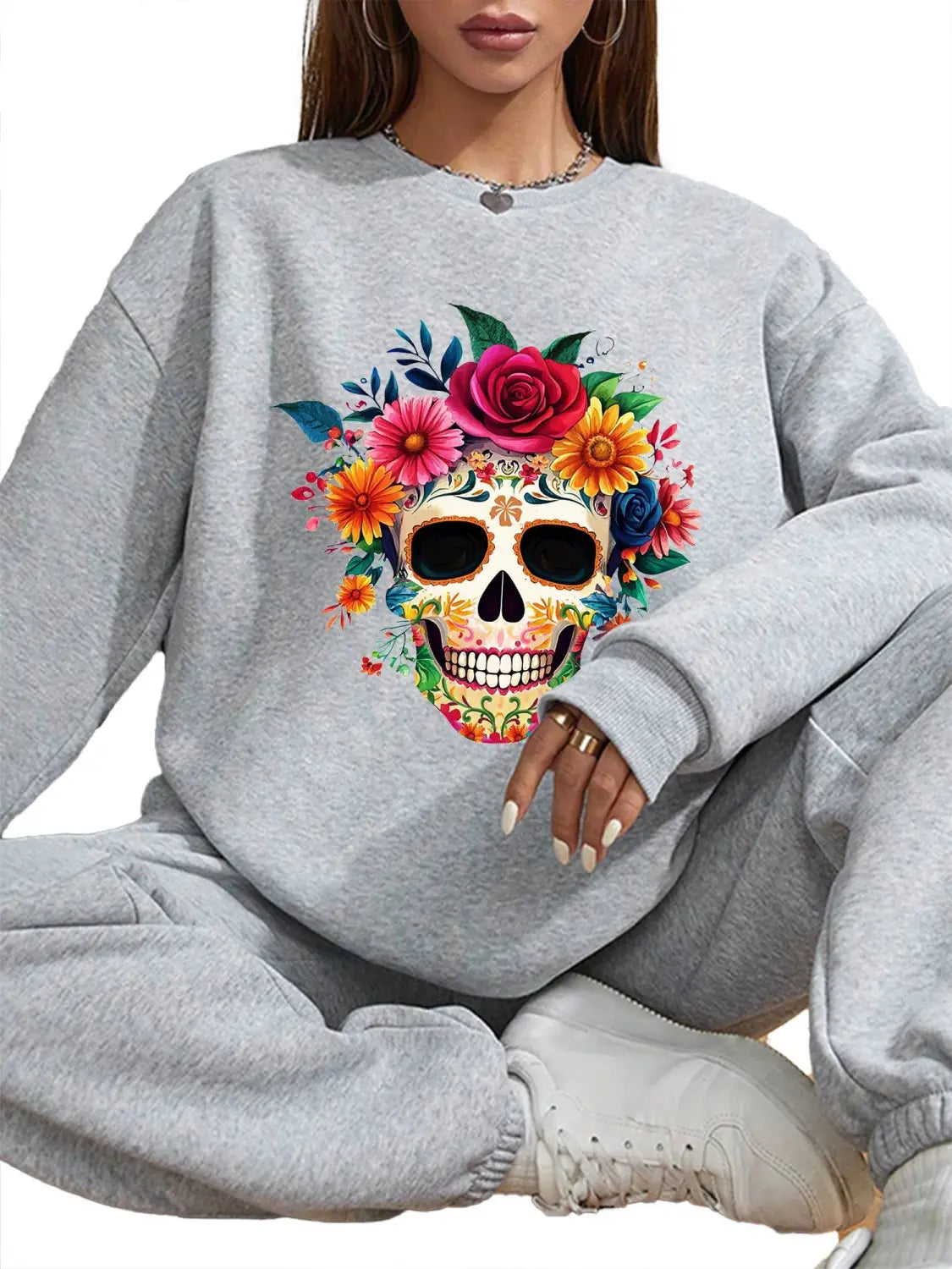 gray crew neck sweatshirt featuring a vibrant colorful floral skull design with roses and blossoms in pink yellow orange blue and green suitable for daily wear basic long sleeve style
