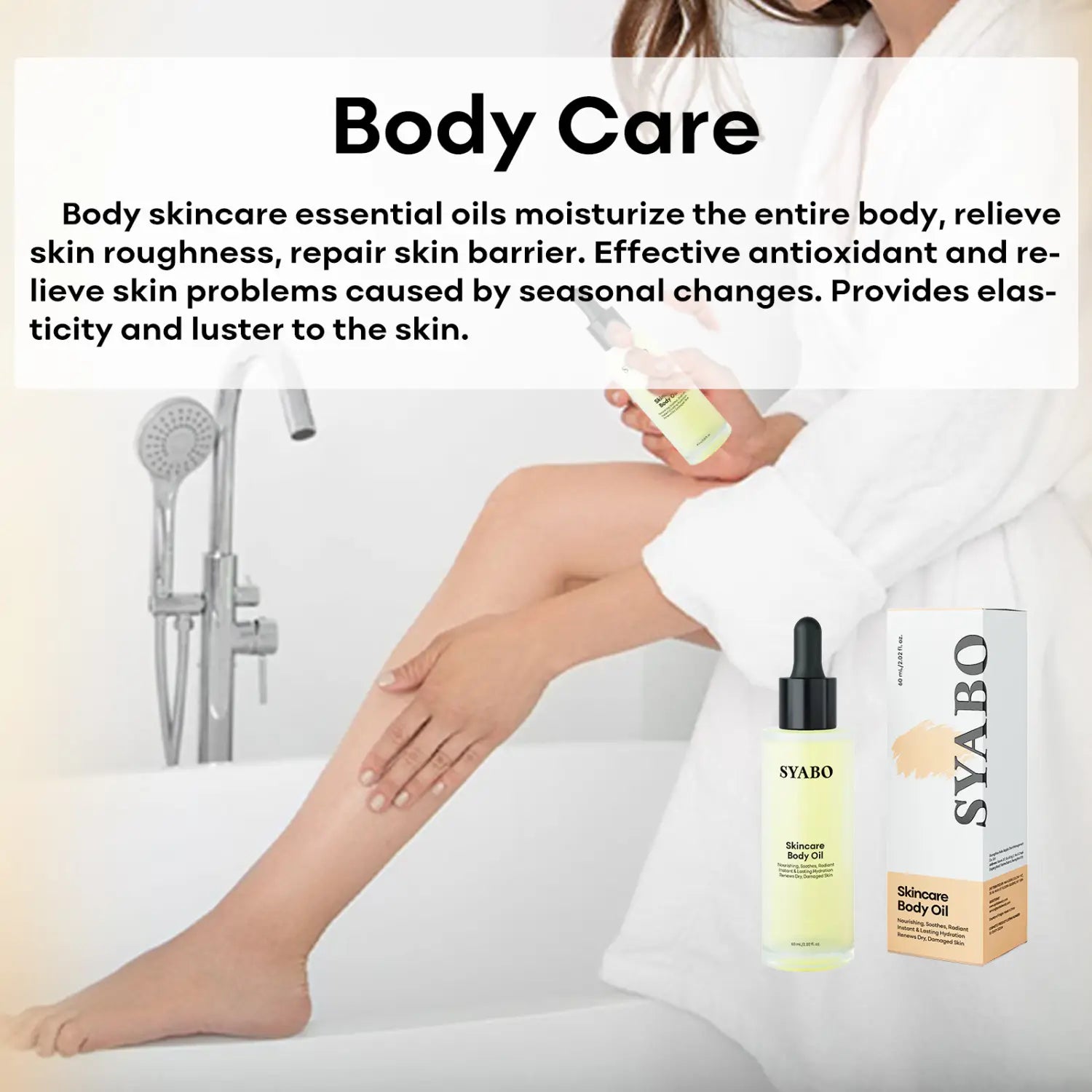 a clear glass bottle with a black dropper cap containing pale yellow syabo skincare body oil sits beside its matching white and beige packaging in a body care essential oils with dropper set.