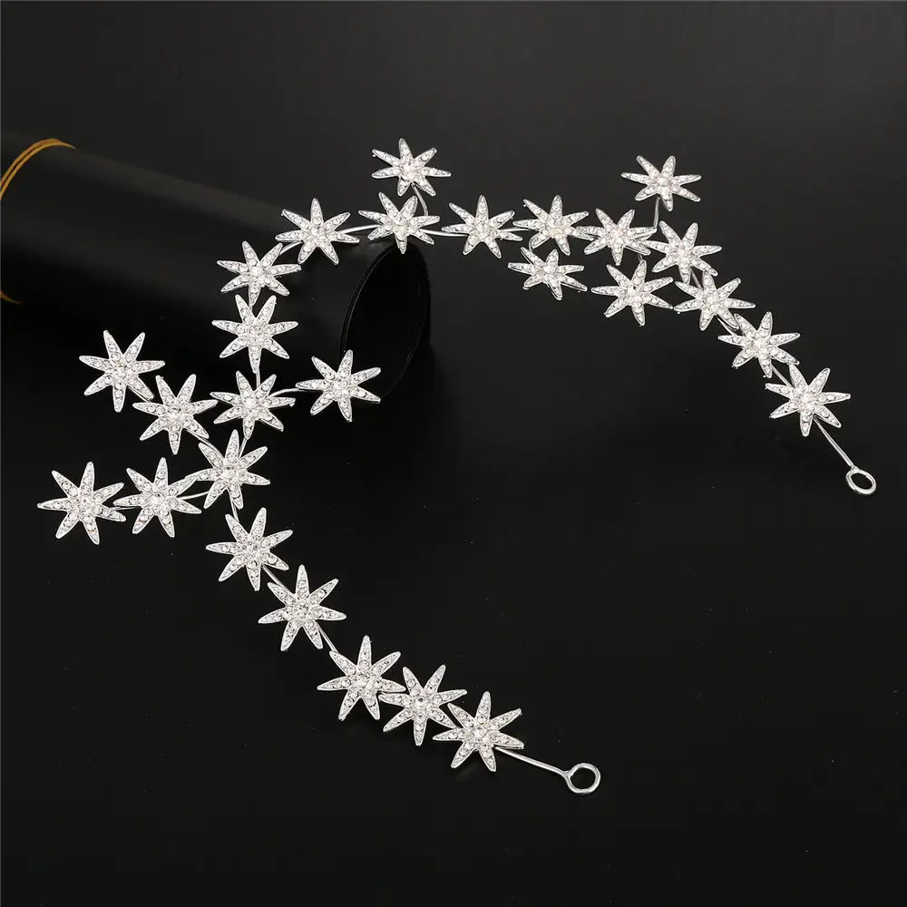 A sparkling silver star rhinestone starry hair band featuring clear crystals designed as elegant hair accessories starry.