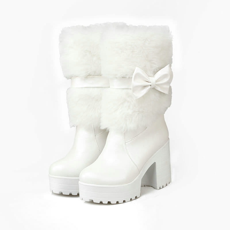 White platform sweet bow boots with fluffy faux fur cuffs and a satin bow on the side ideal for winter snow sweet style.