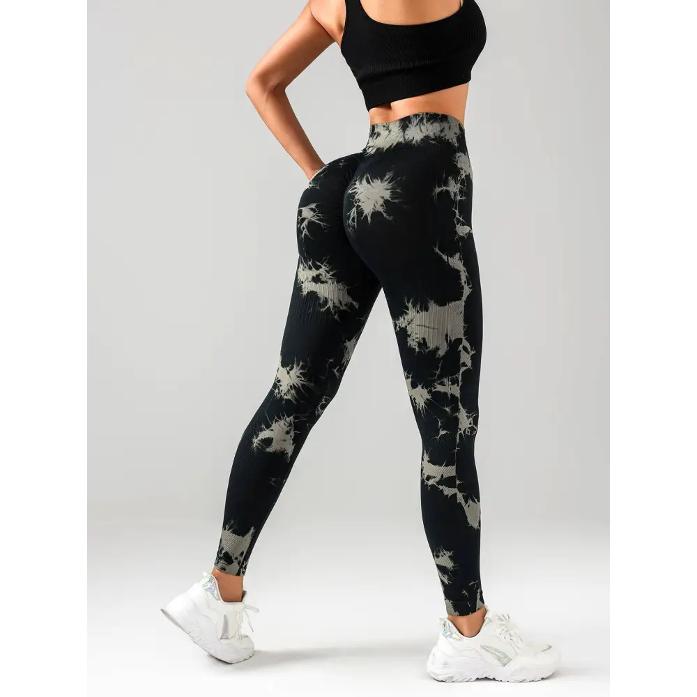 Black and gray tie dye high waist seamless leggings with ribbed waistband designed for a butt lift effect