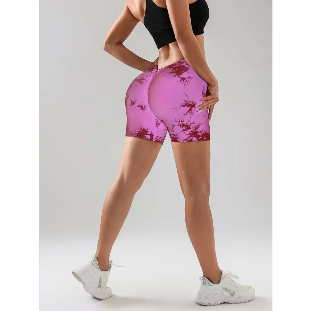 Pink and black pack tie dye high waisted workout shorts with snug butt lift design for activewear use
