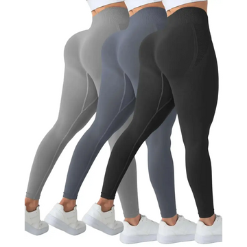 Three pairs of high waisted scrunch seam butt lifting leggings in gray slate blue and black for workouts