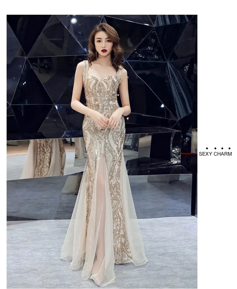 black fishtail long summer evening dress featuring gold-embellished sequins, a sheer overlay, and a high slit in a mermaid style.