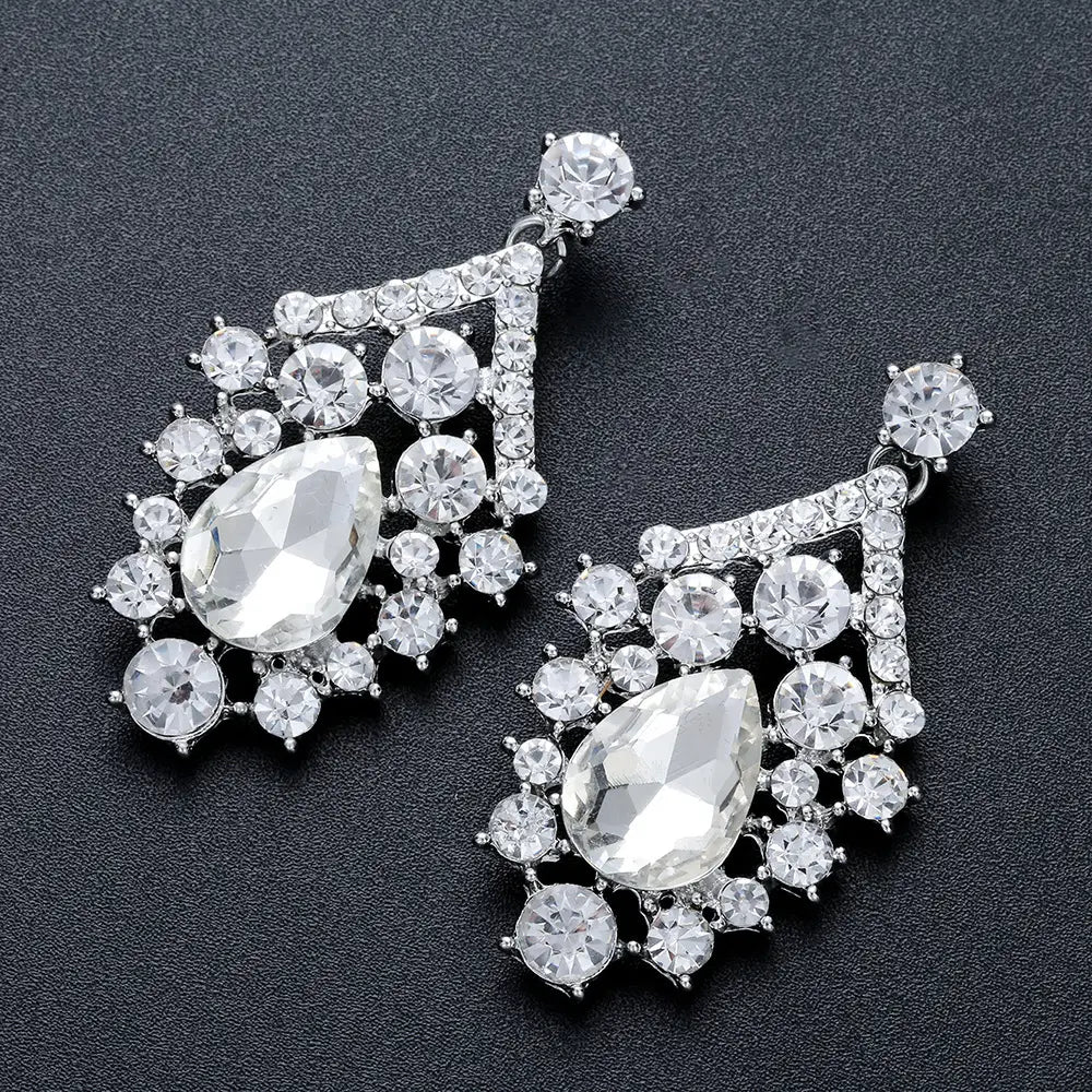 sparkling silver alloy diamond accessories drop earrings featuring a central teardrop crystal surrounded by smaller clear crystals set in an ornate rhinestone-encrusted floral design