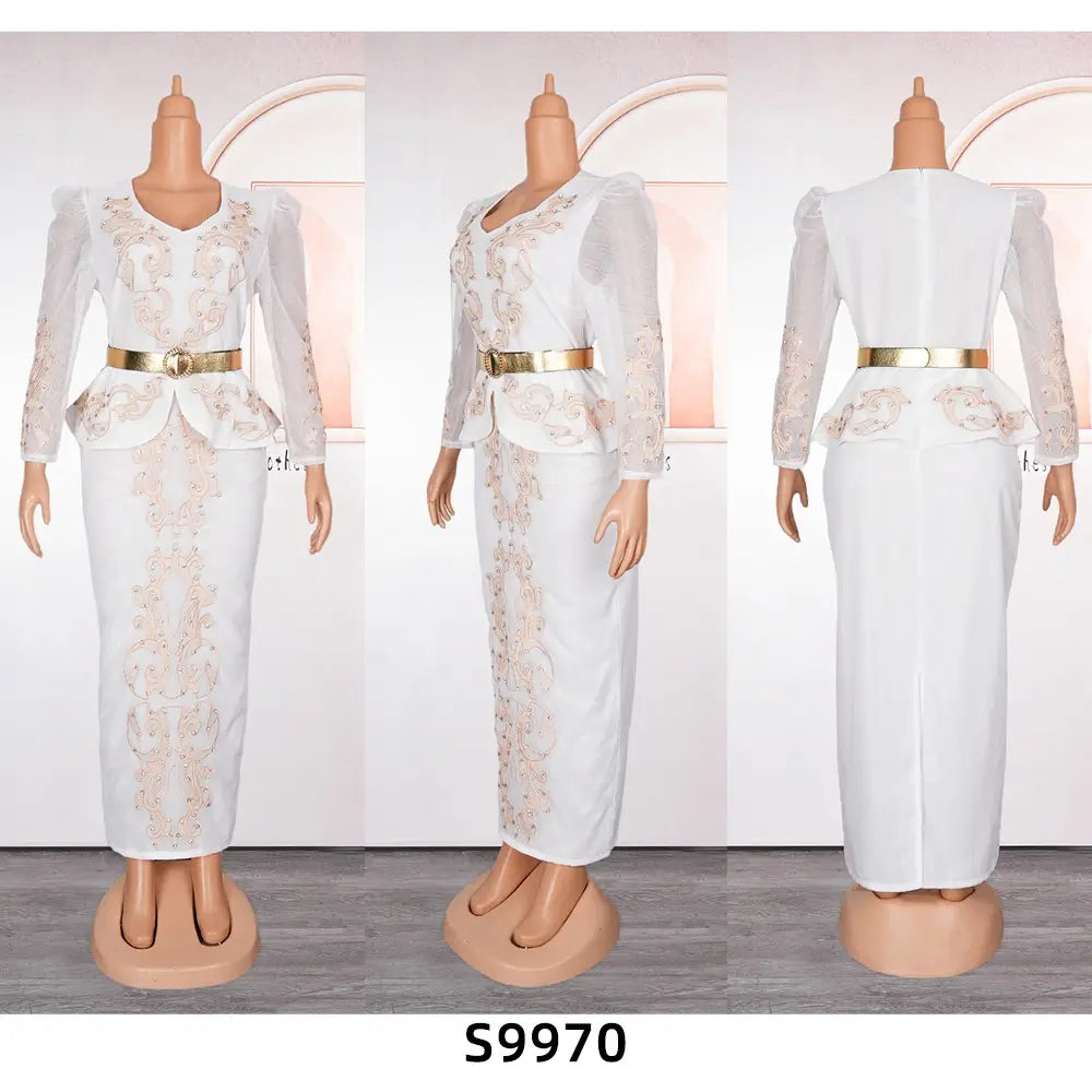 white embroidered two-piece dress with sheer long sleeves and a gold belt complementing a luxury rhinestone beaded black peplum formal dress