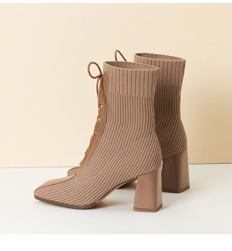 tan lace up square toe chunky heel knit boots featuring tan ribbed knit material with a square toe chunky heel and lace-up front design.