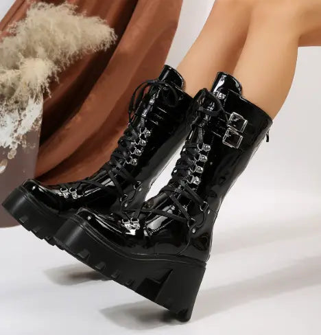black versatile casual leather platform boots featuring patent leather lace-up design with silver-toned buckles and chunky soles for casual leather boots use