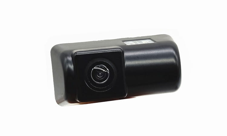 Black rectangular hd night vision reversing rear view camera with a glossy finish and a circular lens centered on its front face for enhanced night vision reversing.