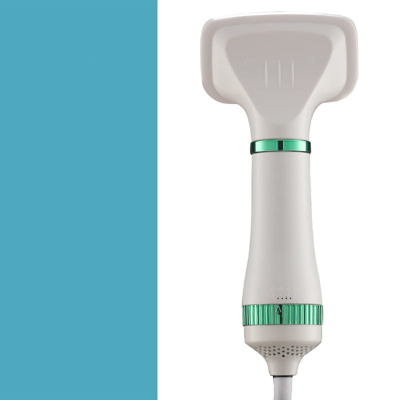 White handheld 5-in-1 pet hair dryer with green accent rings and ergonomic design featuring grooming comb attachments for one-key hair removal.