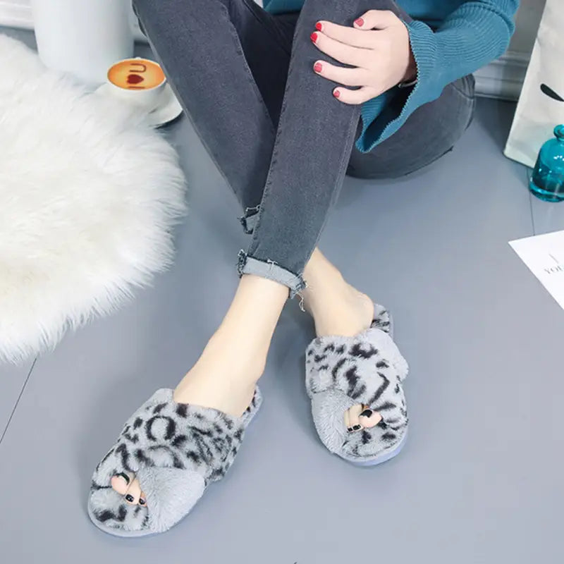 gray fuzzy slippers leopard plush slip-ons featuring a leopard print pattern and small cat face embellishments for indoor use