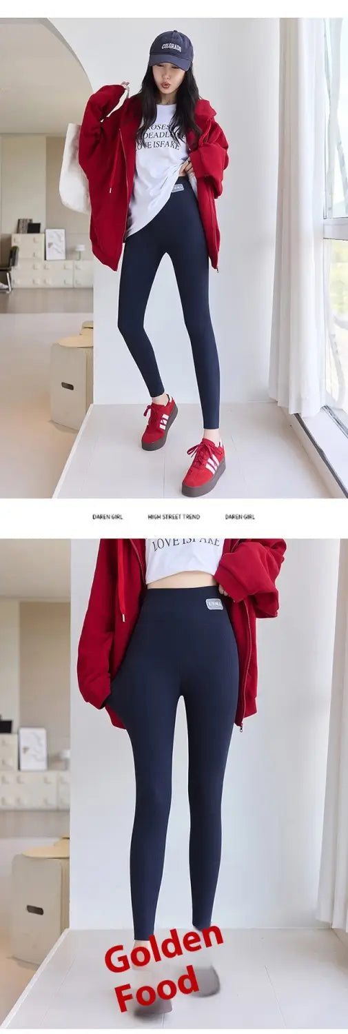 Navy blue high waist high elastic threaded underwear leggings made of smooth, form-fitting material with subtle seam detailing at the waistband.