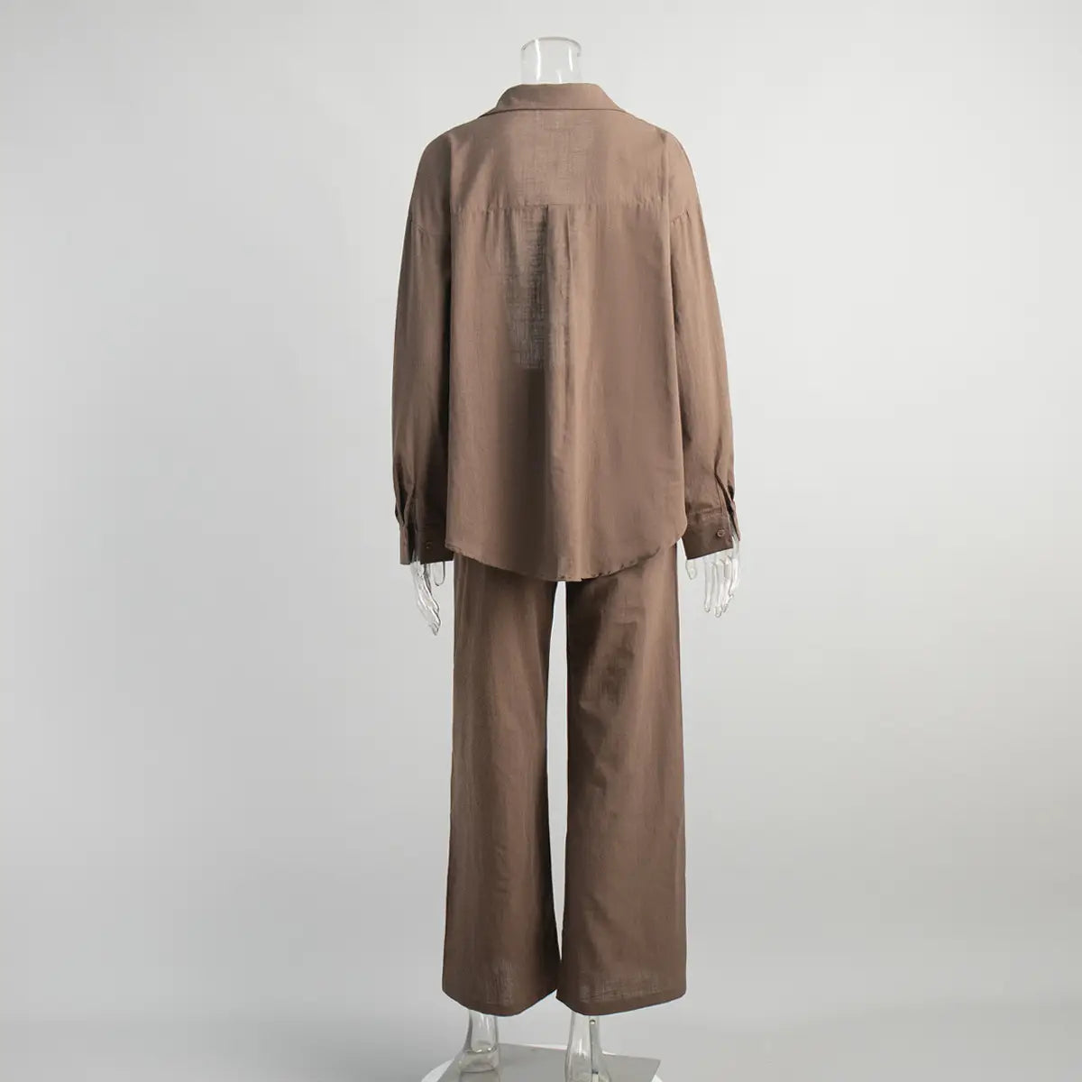 brown linen-blend long sleeve shirt trousers suit featuring a button-up shirt and matching wide-leg trousers in a cotton shirt trousers design
