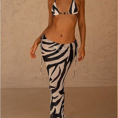 black and white zebra printed bikini strappy set with triangle top and high waisted side tie pants ideal for a strappy skirt casual look