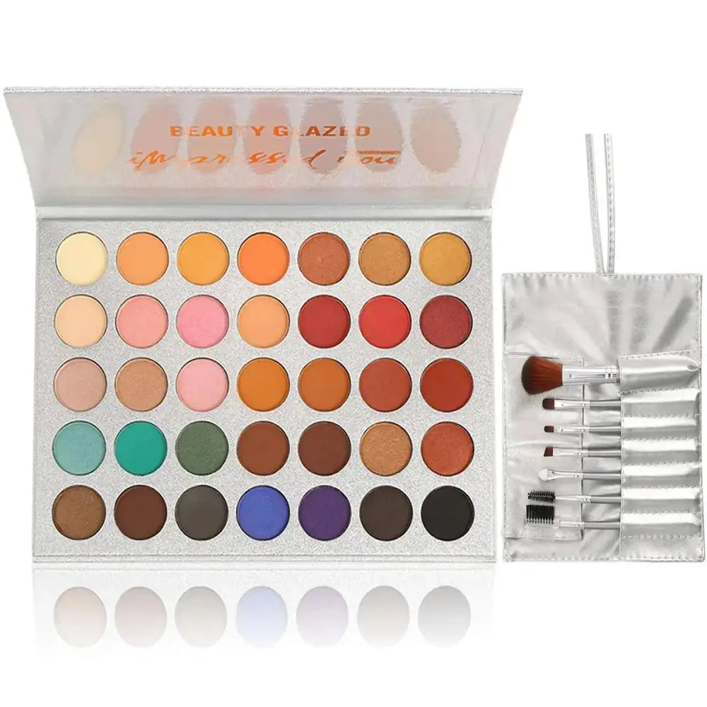 Silver glittery 36 colors eyeshadow palette with 36 vibrant pans and 7pcs makeup brushes for versatile looks