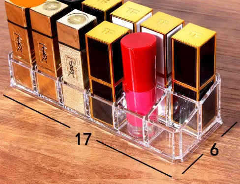 clear acrylic makeup organizer with compartments holding multiple luxury brand lipsticks in their boxes makeup organizer image