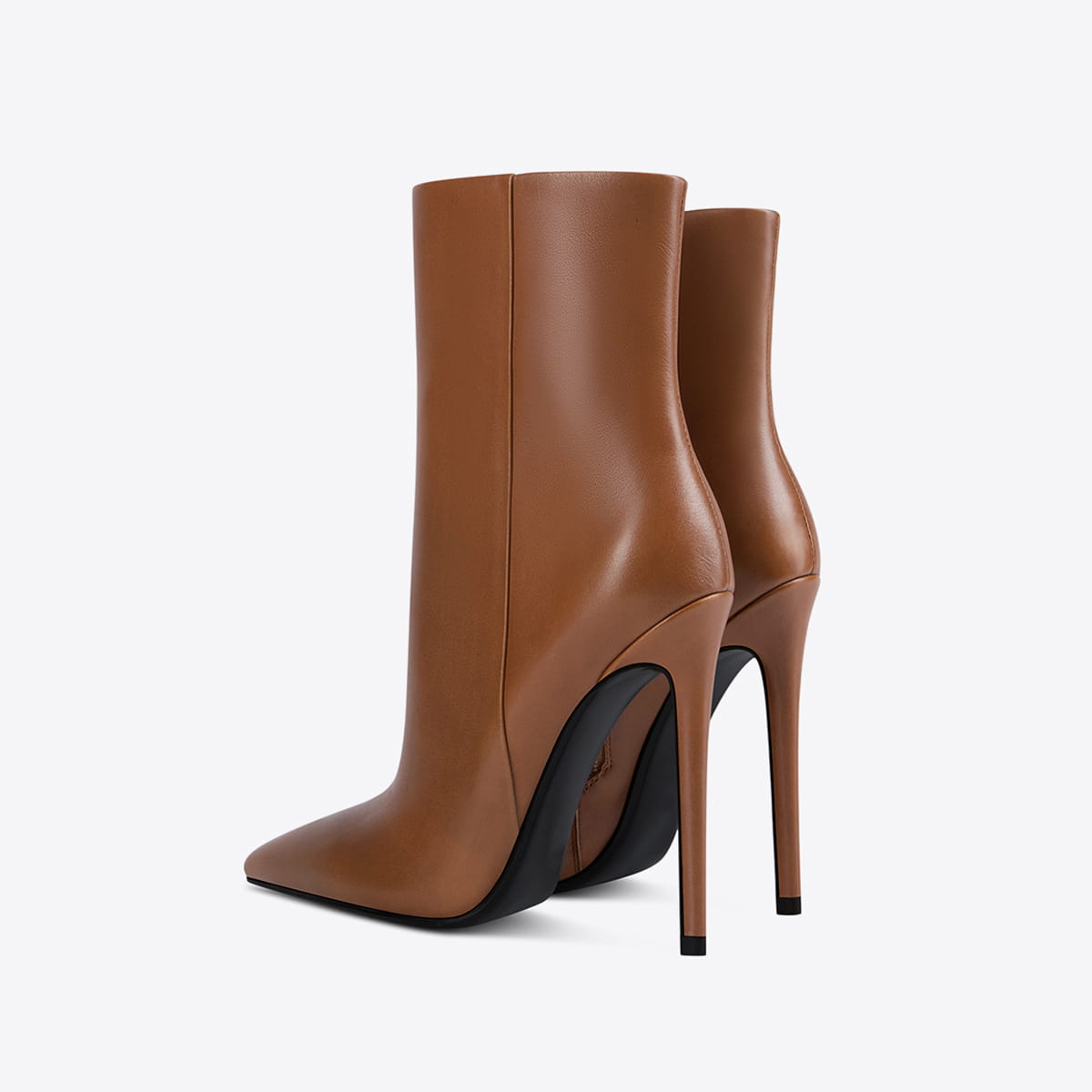 Tan leather stiletto ankle boots featuring a sleek pointed toe and high heel.